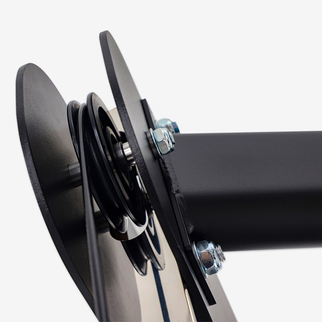 Close-up of a black metal bracket with bolts on a white background