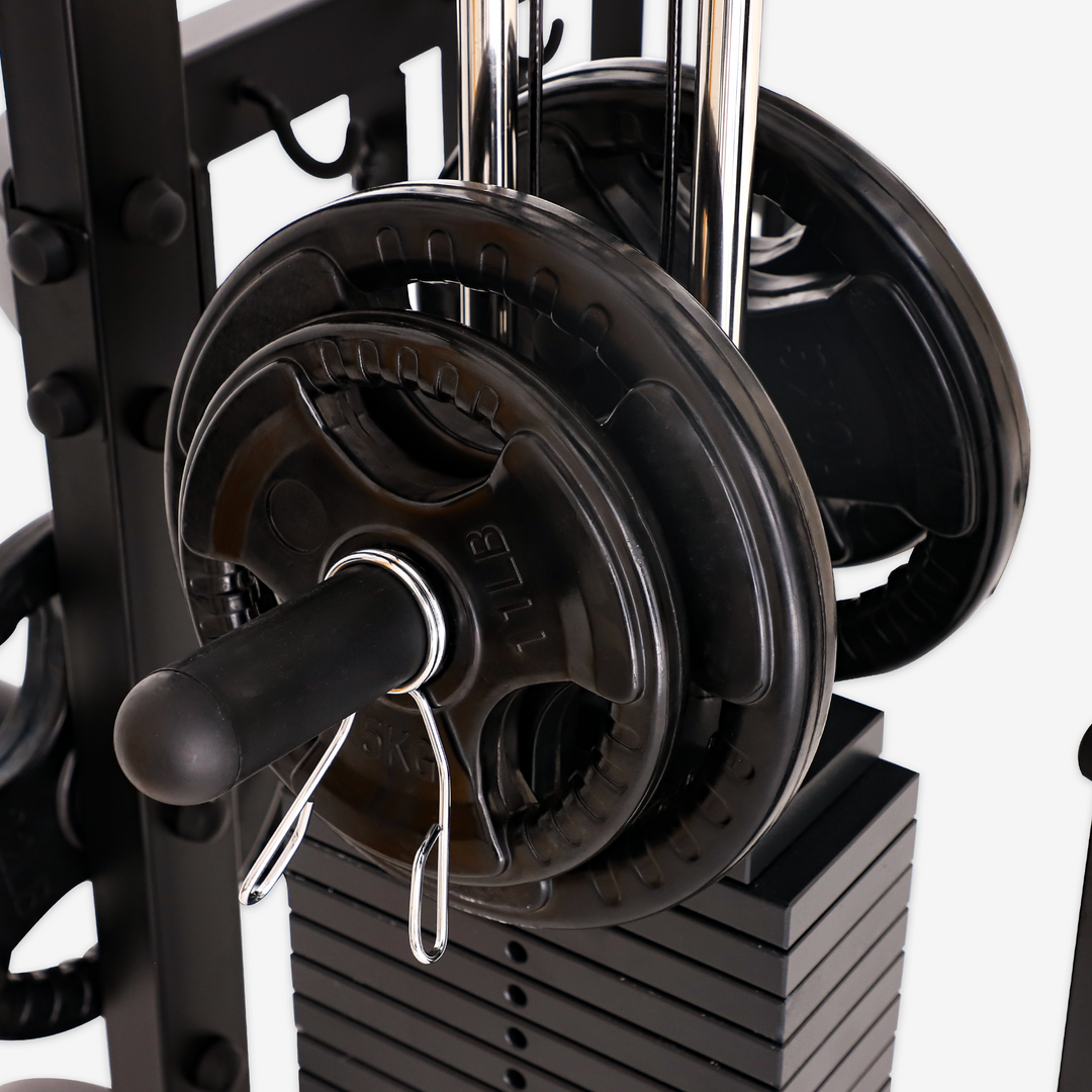 Close-up of a weightlifting barbell with weight plates on a white background