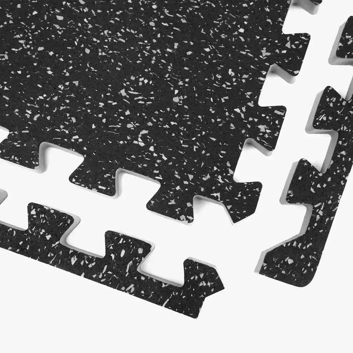 Interlocking rubber mat close-up, ideal for gym equipment like treadmills, kettlebells, and weight benches.
